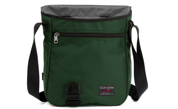 Reverse shot of the Medium Cafe Bag in Wilderness (forest green) 525 Ballistic with Cloud (grey with light grey grid) 210 Cerylon interior